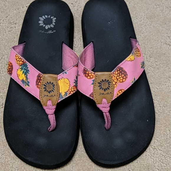 yellow box pineapple flip flops
